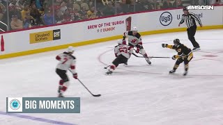 Jack Hughes scores a goal against the Pittsburgh Penguins