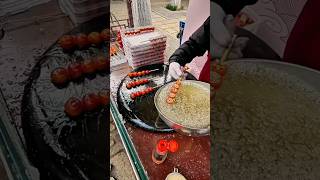 Fresh hawthorn fruits combined with melted sugar to make candied haws🍗🍌🍮#asianstreetfood