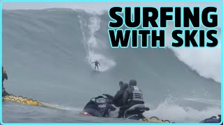 A guy surfing a giant wave with skis, and more...