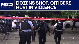 Dozens shot, officers hurt in Memorial Day weekend violence