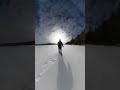 crossing frozen lake on snowshoes dead of winter acadia national park