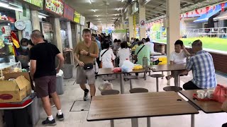 Singapore: Locals at morning hawker market (m&t)