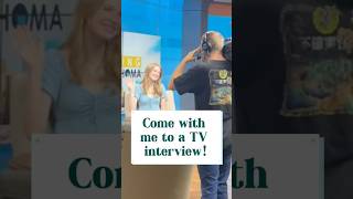 Come with me to a TV interview!