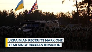 Ukrainian recruits and UK troops mark one year since Russian invasion