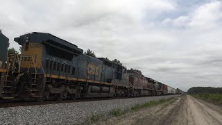 CSX 3226 leads M605-27 through Haywood on the Fitzgerald sub w/CP power and CSX 7765. 5/27/23