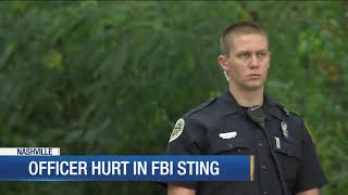 Officer hurt in FBI sting