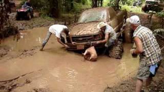 MUD TRUCKS - How NOT to get muddy when you're STUCK!! FUNNY!