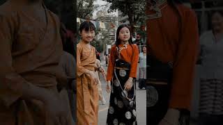 tibetan kids on cultural dress dancing. Toronto CA//