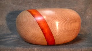 woodturning  a hollow form of beech and padauk