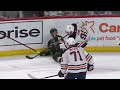 evander kane hits joel eriksson ek at the side boards