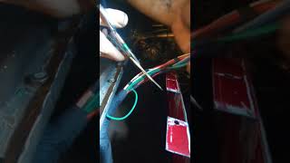 cutting the wire harness off my 1979 MGB to add in some relays