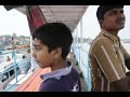 river crossing in a car on a ferry at hatania doania at namkhana bakkhali west bengal india.