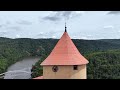 veveri pearl castle on a rocky promontory above the brno dam 4k hdr 60 fps drone 🌤️ may 2024