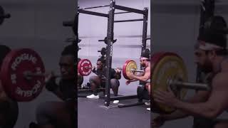 Pause Squatting 453LBS with 2 ridiculously strong lifters spotting and hyping me up.