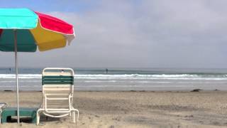 La Jolla time lapse - beach with umbrella