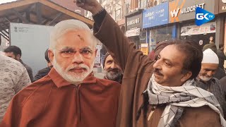 Kashmir resident drapes ‘pheran’ over life-size cut-out of PM Modi in Srinagar