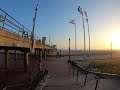 Walking on Huntington Beach's Main Street, across Pacific Coast Highway then north along the beach