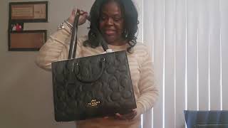 I got my bag yalll!!!!!   Coach Maggie in Black Signature  Leather