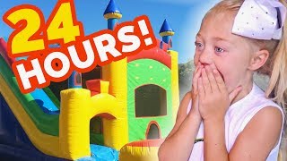 24 HOURS INSIDE A GIANT BOUNCE HOUSE IN OUR BACKYARD!!! (SURPRISING EVERLEIGH)