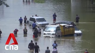 Vehicles and houses submerged as Malaysia sees worst flood in years
