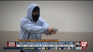 Photo shows Punta Gorda police officer ready to fire