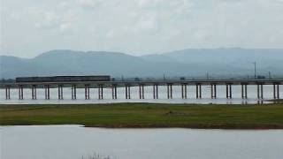 THN DMU crossing curved rail bridge at Khok Salung.