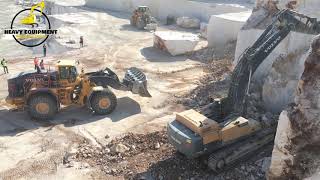 Volvo EC750E Excavator, Volvo EC480D Excavator and Volvo L350H Loader Working In the Marble Quarry