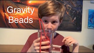 Unschooling with Fin - Gravity Beads Experiment