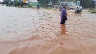 Massive Flooded Waters Gush Through The Road After A Heavy Rain