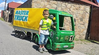 Electric Mercedes Truck for Kids. Green truck with yellow trailer.