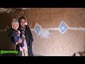 benefactors and a poor nomadic woman with a one year old baby in a cold and soulless hut