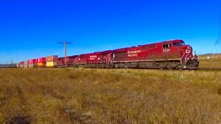 CP 8710 Leads CP 200 (Mixed) East At Cochrane East. CP Laggan Subdivision.