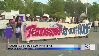 Group holds protest against immigration laws in Cooper-Young