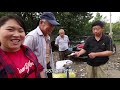 the fat girl picked up two bags of chestnuts to sell