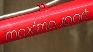 A vintage UNIVEGA MAXIMA SPORT ROAD BIKE in RED!