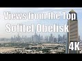 Views of Dubai City from the top of the Sofitel Obelisk Dubai 4K