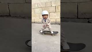 Skateboard boy 2 year old baby skateboarding