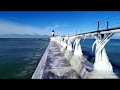 Lake Michigan Lighthouse Ice Covered Frozen 4K Drone Footage .