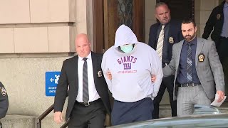 Queens shooting suspect taken for booking