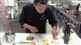 Kervarrec prepares a dish at the 2 Michelin Chèvre d'Or in Eze