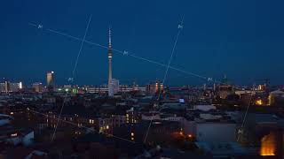 AERIAL: Day to Night Drone Hyper Lapse, Motion Time Lapse over Berlin with Alexanderplatz TV Tower