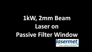 Laser filter windows struck by kW lasers - the results