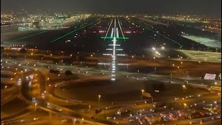 Pilot view of Landing at Dubai Airport Day and Night