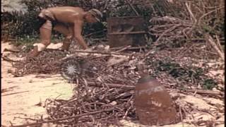 A US Marine removes a Japanese aerial bomb and a torpedo in Guam, Mariana Islands...HD Stock Footage