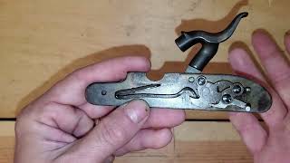 How a muzzleloading lock works