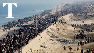 Drone shows thousands of Palestinians returning to northern Gaza