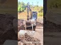 excavator assisted cement pipe moving