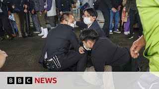 Japan PM evacuated after apparent smoke bomb blast during speech – BBC News