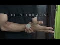 COIN THROUGH WRIST