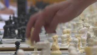 Chess grandmaster plays 55 kids at once